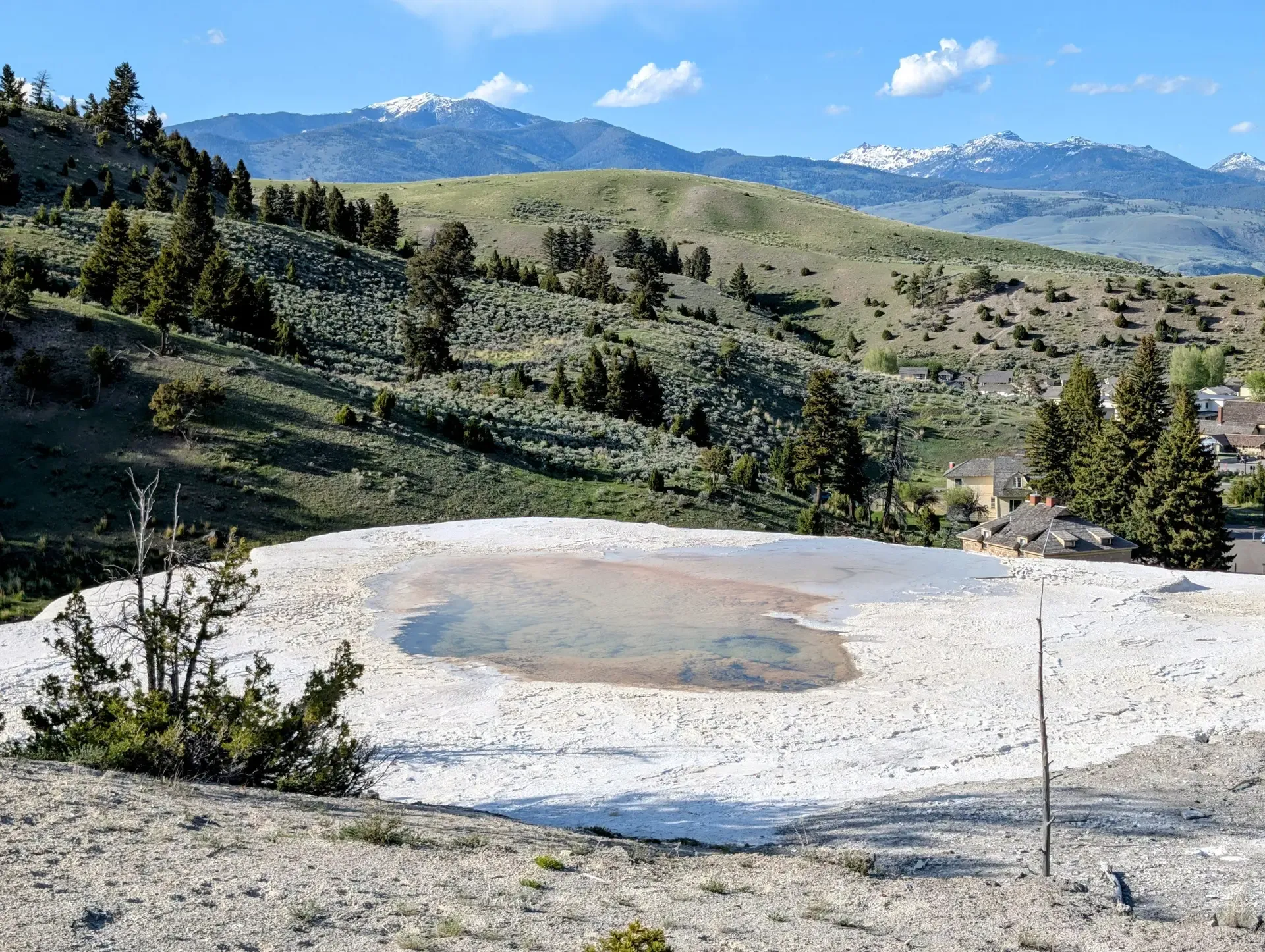 Thermal spring overlooking a valley at Yellowstone National Park
