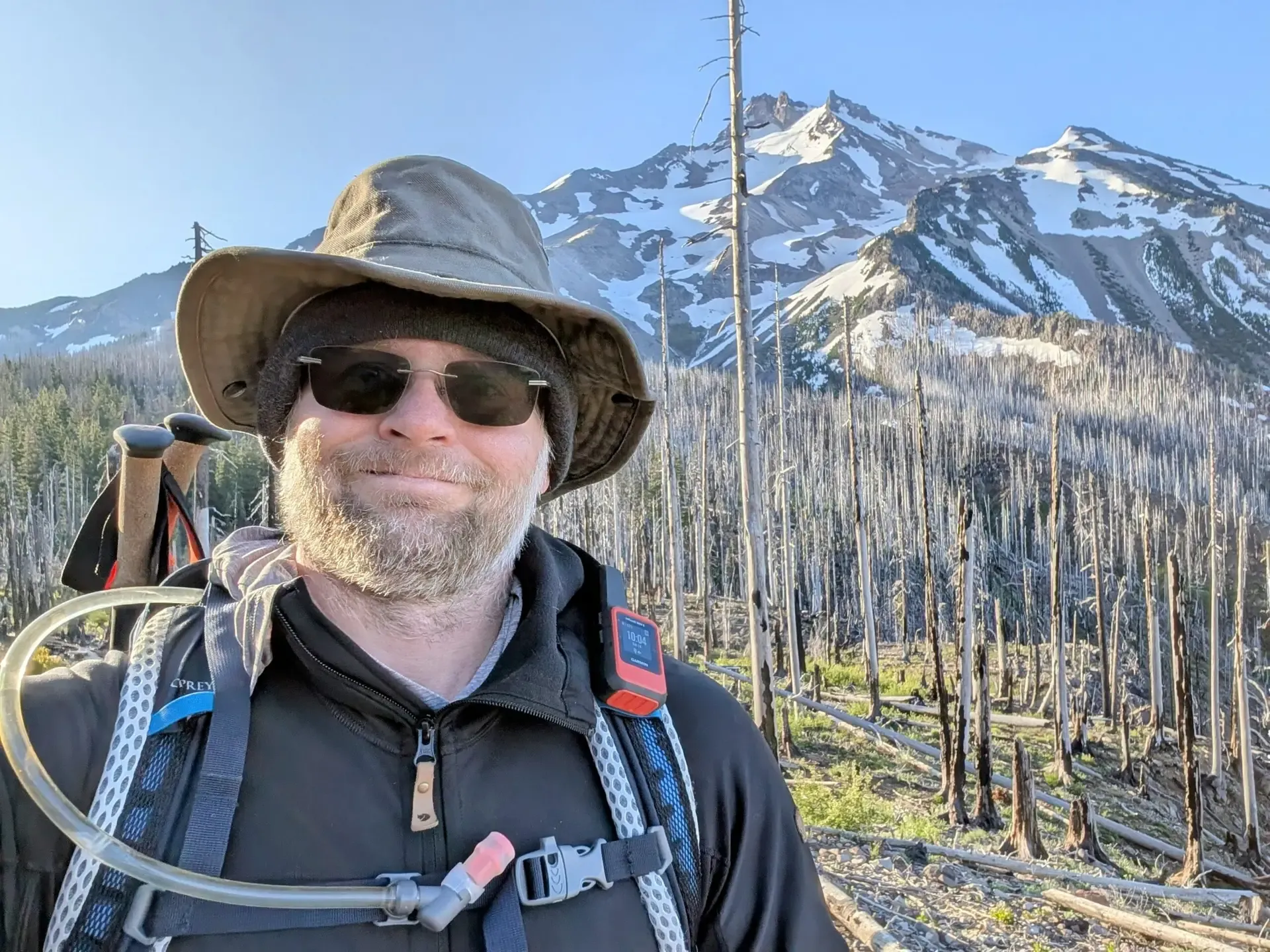 Brett standing in front of Mount Jefferson in Oregon